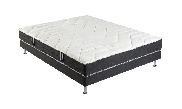 Un matelas avec matelas mousse alvéolaire avec 5 zones de confort. Avec un sommier en tissu gris. De 23cm de hauteur. Meubloo